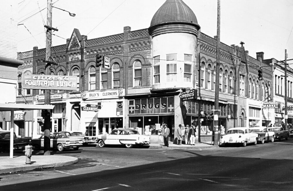 An historic image of a corner of the Albina District. These buildings were demolished through eminent domain.